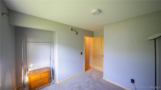 195 Jamie Dr, Camdenton, MO 65020 - unfurnished bedroom featuring baseboards and carpet