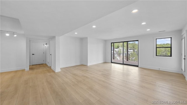 4452 Hamrock Ln, Osage Beach, MO 65065 - spare room featuring recessed lighting and light wood finished floors