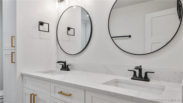 4452 Hamrock Ln, Osage Beach, MO 65065 - full bathroom featuring double vanity and toilet