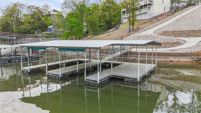 4452 Hamrock Ln, Osage Beach, MO 65065 - dock area with a water view and boat lift