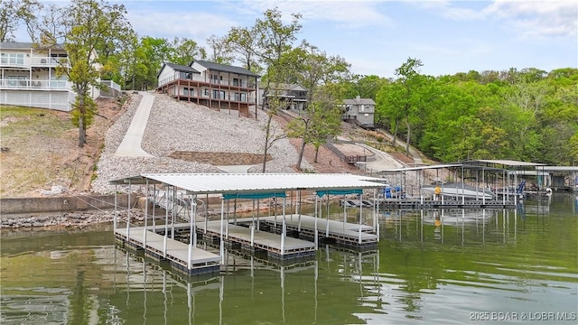 4452 Hamrock Ln, Osage Beach, MO 65065 - dock featuring a water view and boat lift
