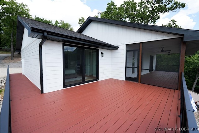 4452 Hamrock Ln, Osage Beach, MO 65065 - wooden deck featuring a sunroom and ceiling fan
