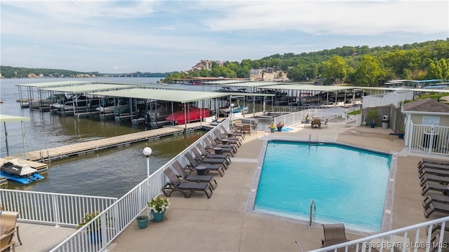 4499 Ski Dr Unit 346, Osage Beach, MO 65065 - community pool with a boat dock and a water view
