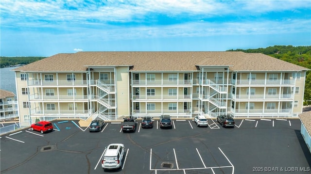 4499 Ski Dr Unit 346, Osage Beach, MO 65065 - view of apartment building / complex featuring uncovered parking
