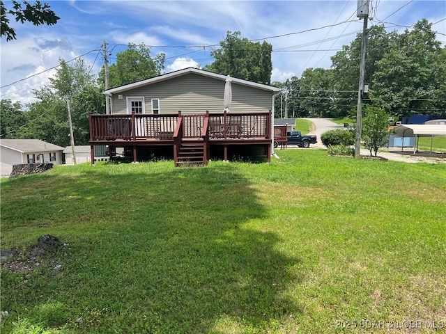 965 Four Waters Dr, Sunrise Beach, MO 65079 - back of property featuring a deck and a lawn