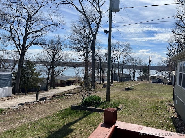 965 Four Waters Dr, Sunrise Beach, MO 65079 - view of grassy yard