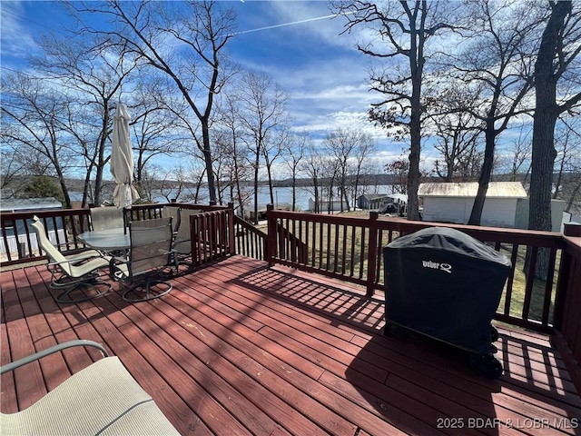 965 Four Waters Dr, Sunrise Beach, MO 65079 - deck with a grill, a water view, and outdoor dining area