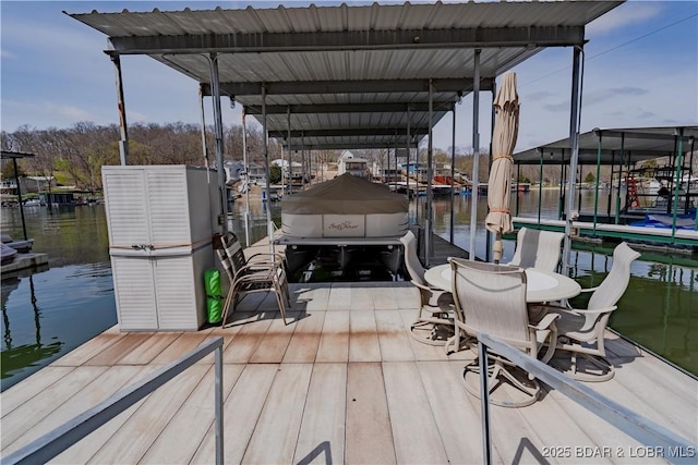 965 Four Waters Dr, Sunrise Beach, MO 65079 - dock with boat lift and a water view