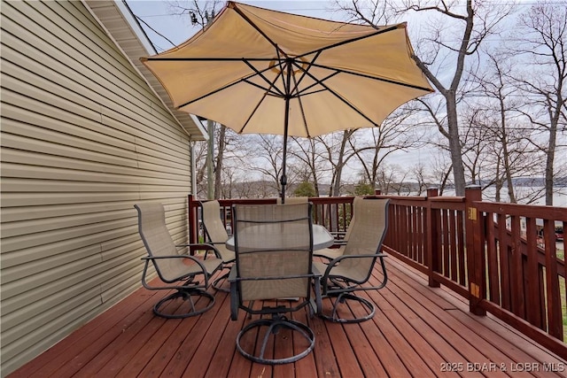 965 Four Waters Dr, Sunrise Beach, MO 65079 - wooden deck featuring outdoor dining area