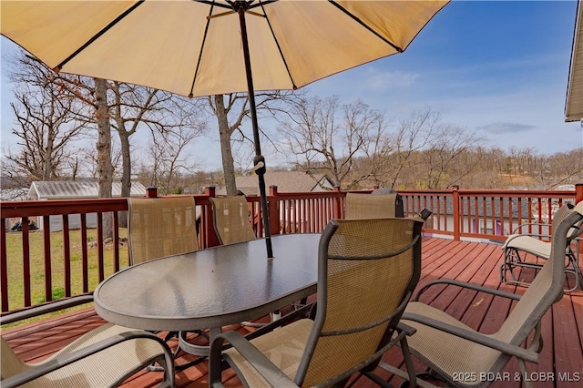 965 Four Waters Dr, Sunrise Beach, MO 65079 - wooden deck with outdoor dining space