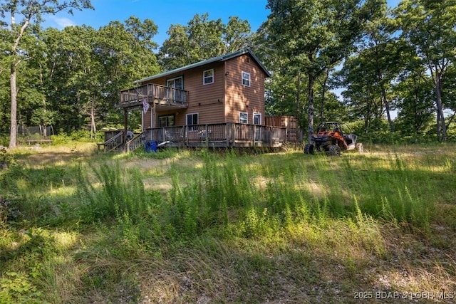 32655 Challenge Dr, Lincoln, MO 65338 - back of property featuring a wooden deck
