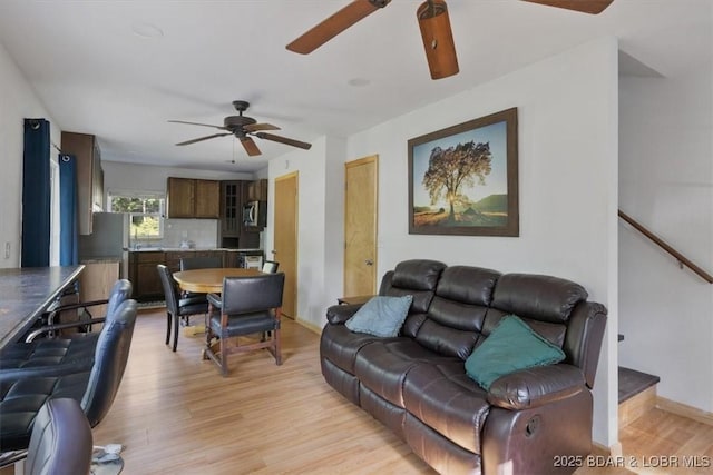 32655 Challenge Dr, Lincoln, MO 65338 - living room with ceiling fan and light wood-style flooring