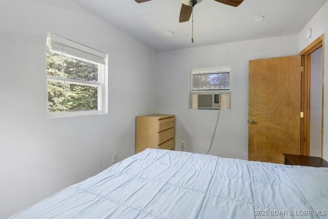 32655 Challenge Dr, Lincoln, MO 65338 - bedroom featuring cooling unit and a ceiling fan