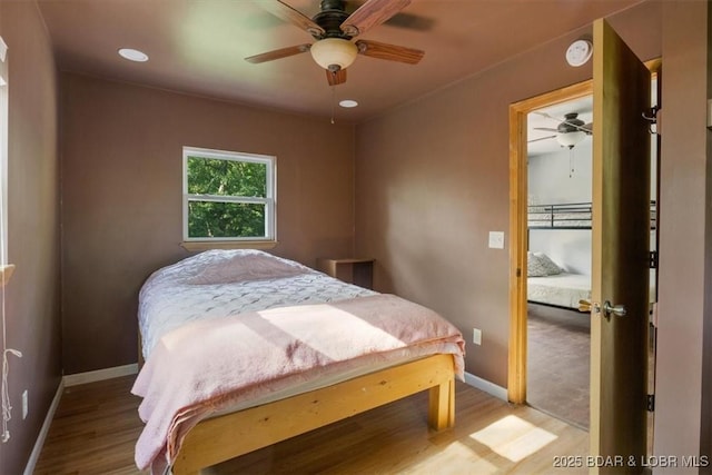 32655 Challenge Dr, Lincoln, MO 65338 - bedroom with wood finished floors, recessed lighting, and ceiling fan