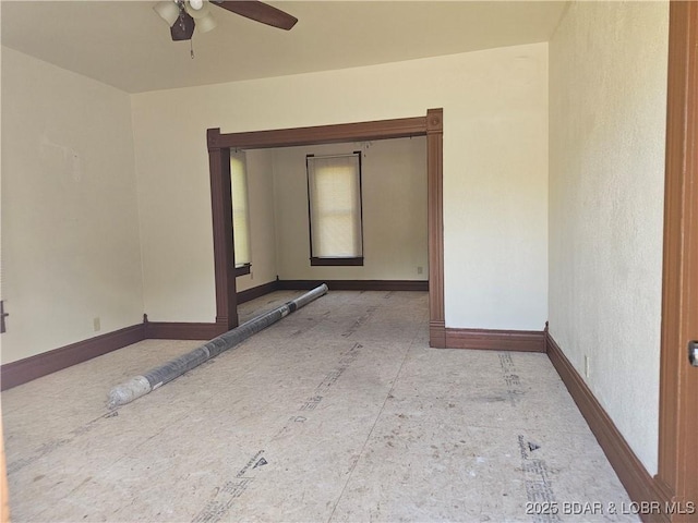 234 W 7th St, Eldon, MO 65026 - spare room featuring a ceiling fan and baseboards