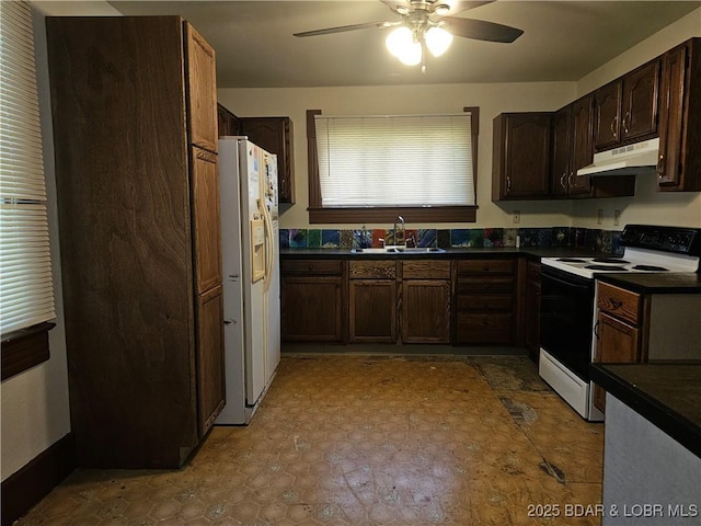 234 W 7th St, Eldon, MO 65026 - kitchen featuring range with electric stovetop, under cabinet range hood, white fridge with ice dispenser, dark countertops, and ceiling fan