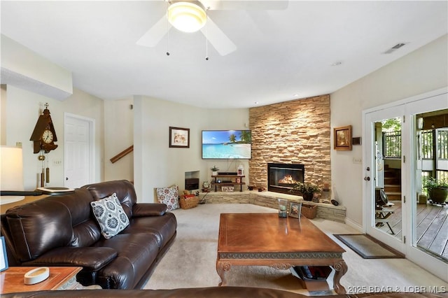 1078 Cornett Branch Rd, Lake Ozark, MO 65049 - living area featuring carpet, ceiling fan, and a fireplace