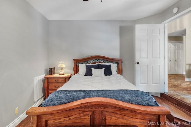 1078 Cornett Branch Rd, Lake Ozark, MO 65049 - bedroom with baseboards and wood finished floors