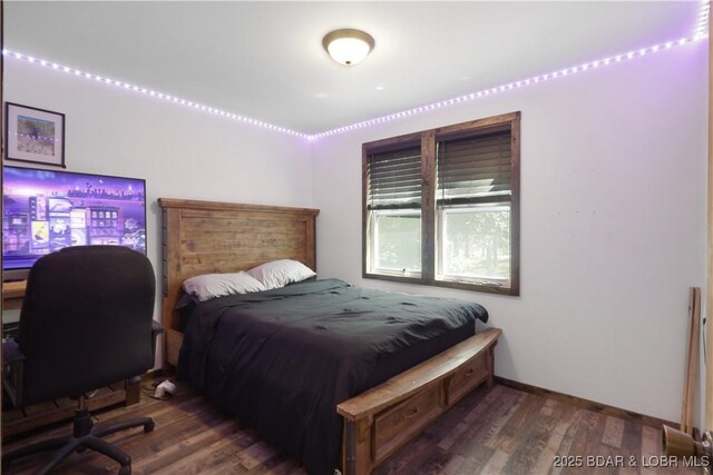 5109 Aqua Dr, Osage Beach, MO 65065 - bedroom with wood finished floors and a desk