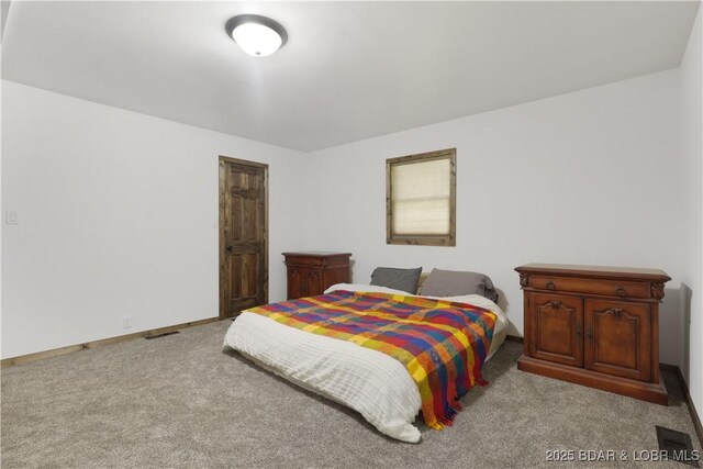 5109 Aqua Dr, Osage Beach, MO 65065 - bedroom featuring carpet flooring and baseboards
