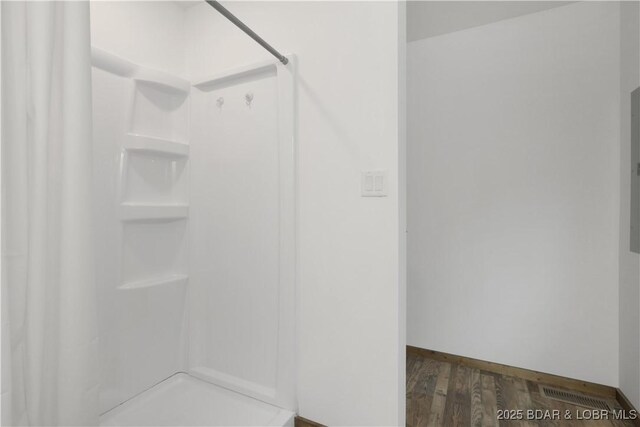 5109 Aqua Dr, Osage Beach, MO 65065 - full bath with a shower and wood finished floors
