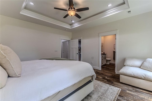 28 Simple Time Dr, Camdenton, MO 65020 - bedroom with a raised ceiling, crown molding, dark wood-style flooring, ensuite bath, and recessed lighting