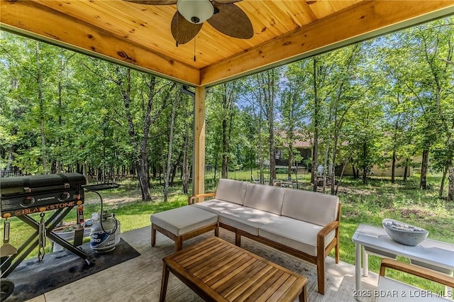28 Simple Time Dr, Camdenton, MO 65020 - view of patio featuring an outdoor living space, a ceiling fan, view of wooded area, and a grill