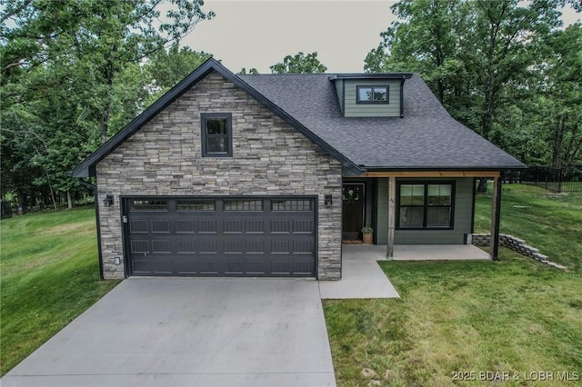 28 Simple Time Dr, Camdenton, MO 65020 - view of front of home with stone siding, roof with shingles, driveway, and a front lawn