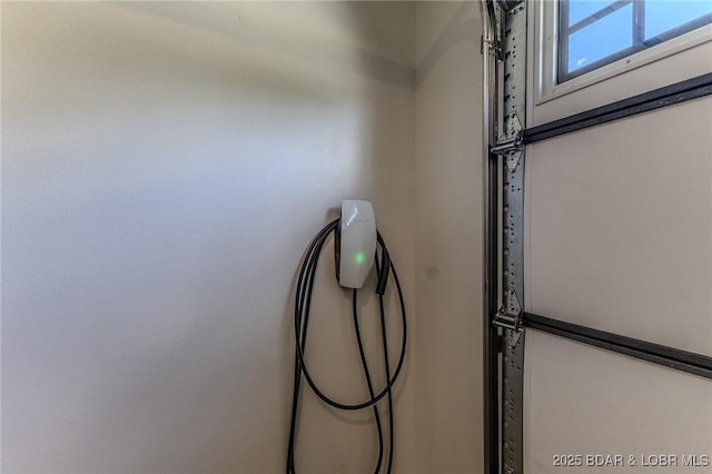 28 Simple Time Dr, Camdenton, MO 65020 - garage view of electric vehicle charger