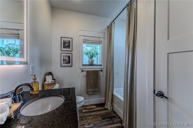 28 Simple Time Dr, Camdenton, MO 65020 - bathroom featuring wood finished floors, vanity, shower / bathtub combination with curtain, and a textured wall