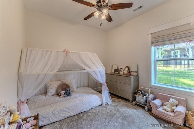 28 Simple Time Dr, Camdenton, MO 65020 - bedroom featuring multiple windows, ceiling fan, and wood finished floors