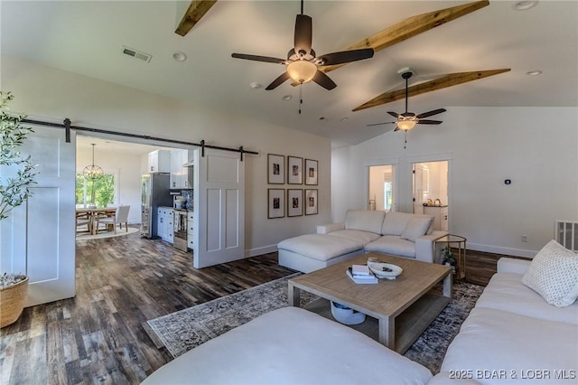 28 Simple Time Dr, Camdenton, MO 65020 - living room with a barn door, ceiling fan, and dark wood finished floors