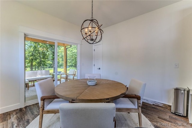 28 Simple Time Dr, Camdenton, MO 65020 - dining room with a chandelier and dark wood-style flooring