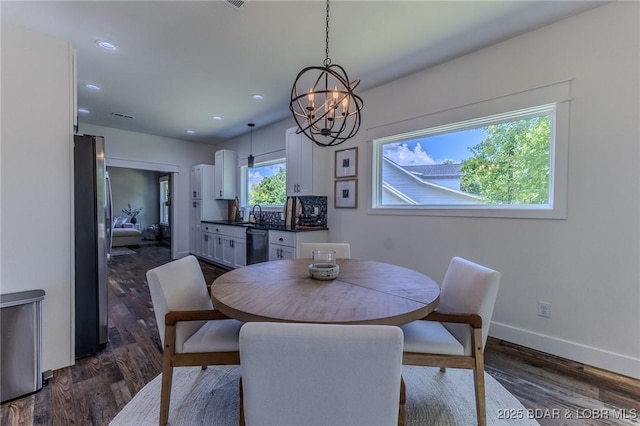 28 Simple Time Dr, Camdenton, MO 65020 - dining area with a chandelier, dark wood finished floors, and recessed lighting