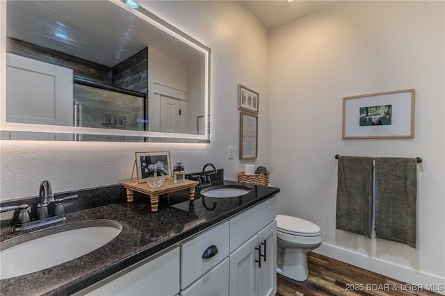 28 Simple Time Dr, Camdenton, MO 65020 - bathroom with double vanity, wood finished floors, and tiled shower