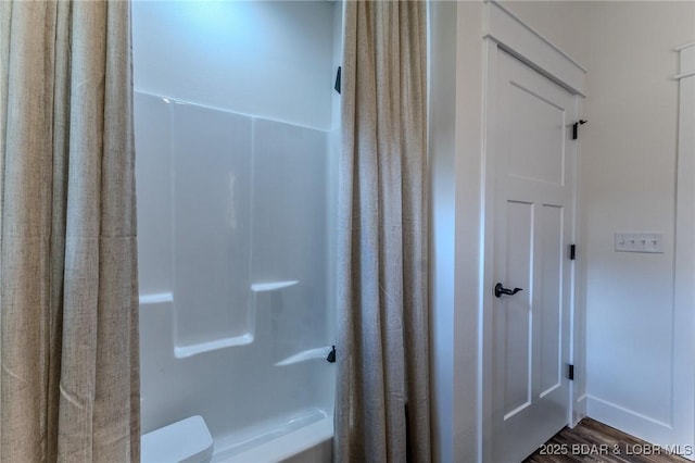 28 Simple Time Dr, Camdenton, MO 65020 - bathroom featuring a shower with shower curtain and wood finished floors
