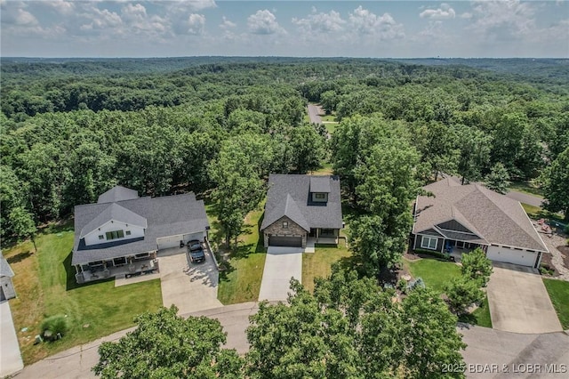 28 Simple Time Dr, Camdenton, MO 65020 - aerial view of property and surrounding area featuring a heavily wooded area