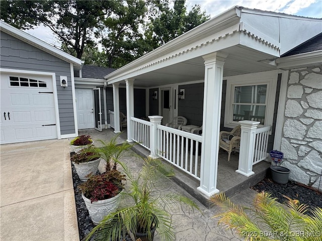 1215 Anemone Rd, Lake Ozark, MO 65049 - view of property exterior featuring a porch and stone siding