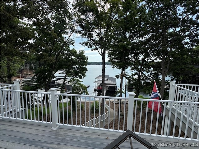 1215 Anemone Rd, Lake Ozark, MO 65049 - wooden terrace with a water view