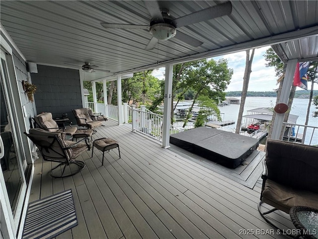 1215 Anemone Rd, Lake Ozark, MO 65049 - wooden terrace featuring ceiling fan and a water view