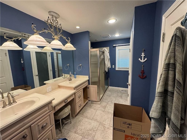 1215 Anemone Rd, Lake Ozark, MO 65049 - bathroom featuring a shower stall, double vanity, and recessed lighting