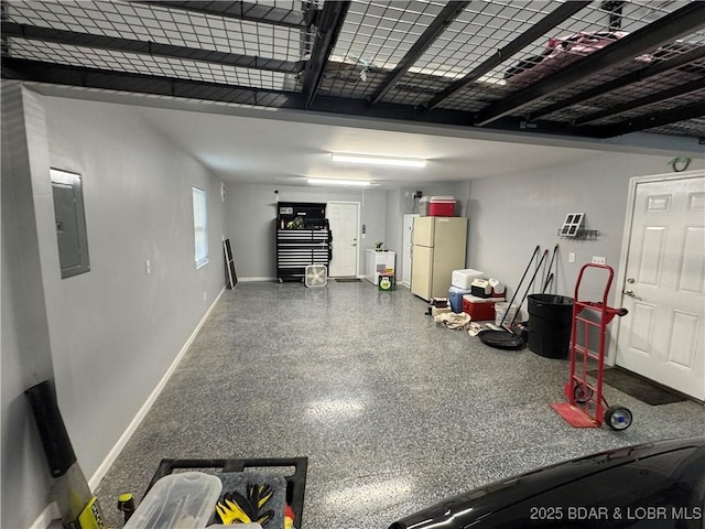 1215 Anemone Rd, Lake Ozark, MO 65049 - garage with freestanding refrigerator and electric panel