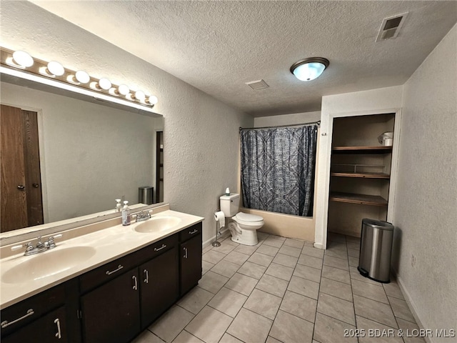 238 Foote Lane Rd, Eldon, MO 65026 - full bathroom featuring a textured wall, double vanity, a textured ceiling, tile patterned floors, and shower / bath combo