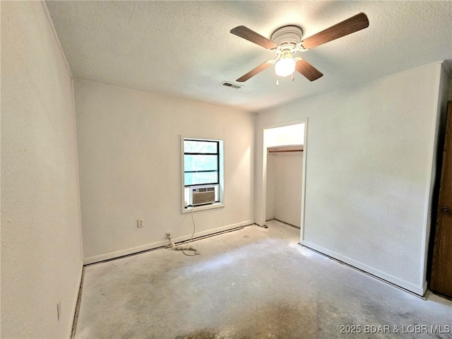 238 Foote Lane Rd, Eldon, MO 65026 - unfurnished bedroom with concrete flooring, cooling unit, a textured ceiling, and a ceiling fan