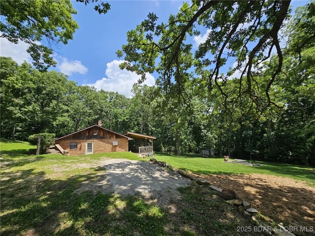 238 Foote Lane Rd, Eldon, MO 65026 - view of grassy yard with a view of trees