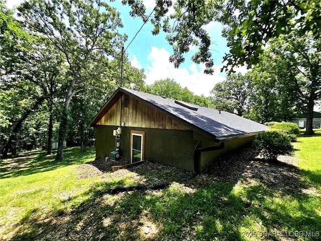 238 Foote Lane Rd, Eldon, MO 65026 - view of property exterior with a yard and a shingled roof