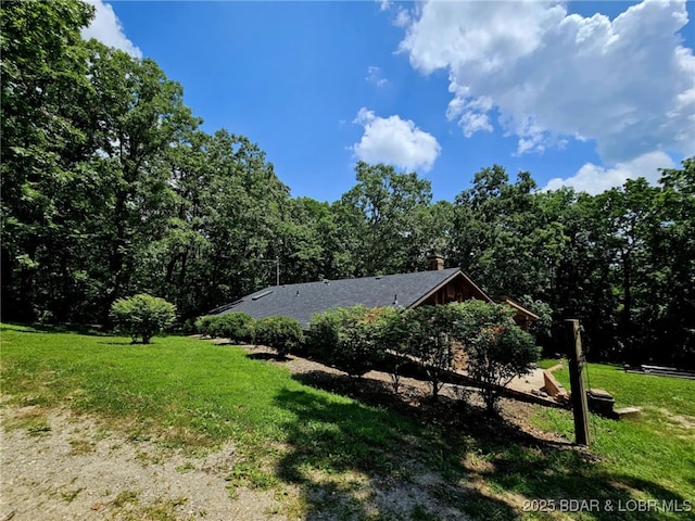 238 Foote Lane Rd, Eldon, MO 65026 - view of green lawn featuring a forest view
