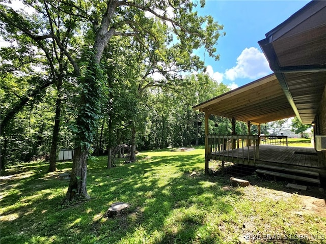 238 Foote Lane Rd, Eldon, MO 65026 - view of grassy yard with a wooden deck
