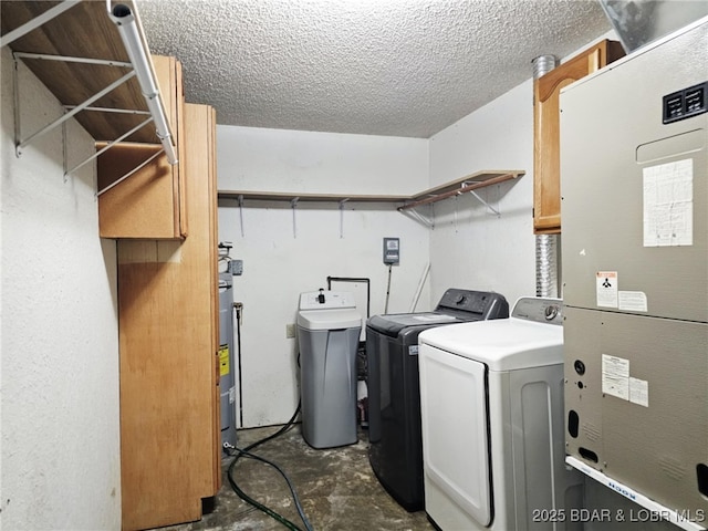 238 Foote Lane Rd, Eldon, MO 65026 - washroom featuring washer and dryer, heating unit, and a textured ceiling