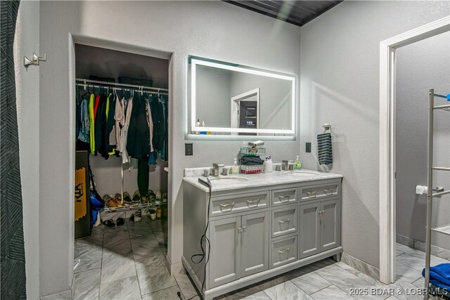 1972 Anderson Hollow Rd, Linn Creek, MO 65052 - full bath featuring marble finish floors, double vanity, and a spacious closet